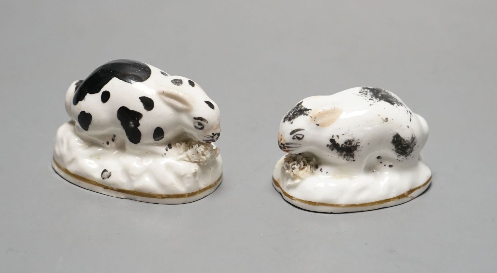 Two Staffordshire porcelain toy models of rabbits, c.1830–50, Provenance: Dennis G. Rice collection, 5 cms wide.